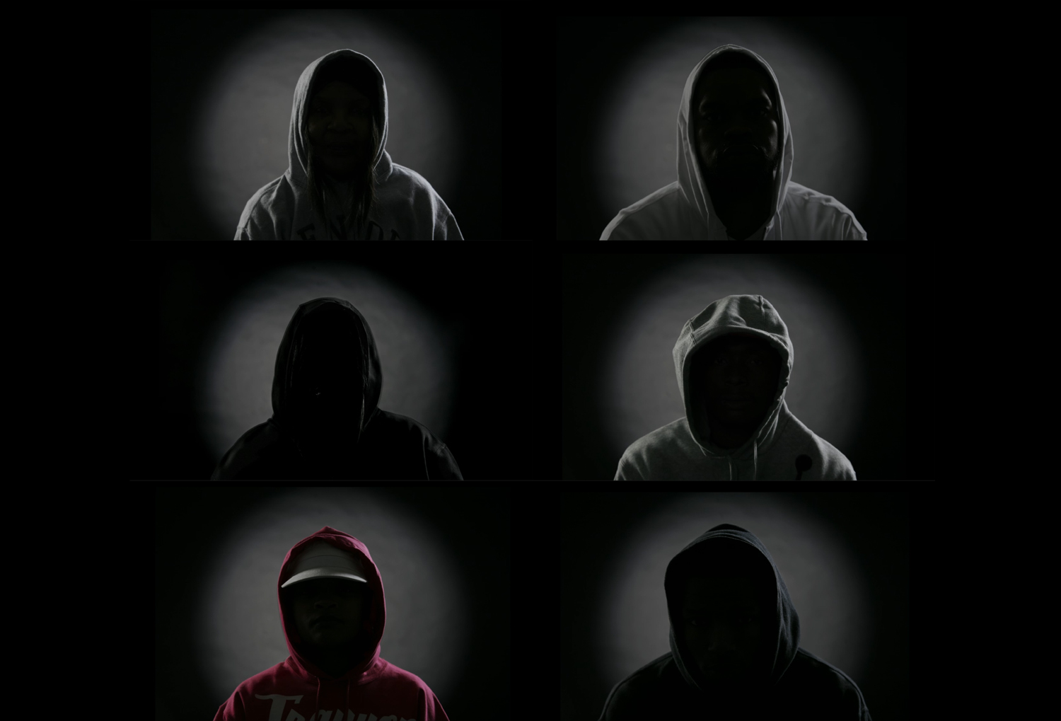 Grid of head and shoulders portraits of 9 black individuals wearing hoodies in wake of Trayvon Martin's death. 
