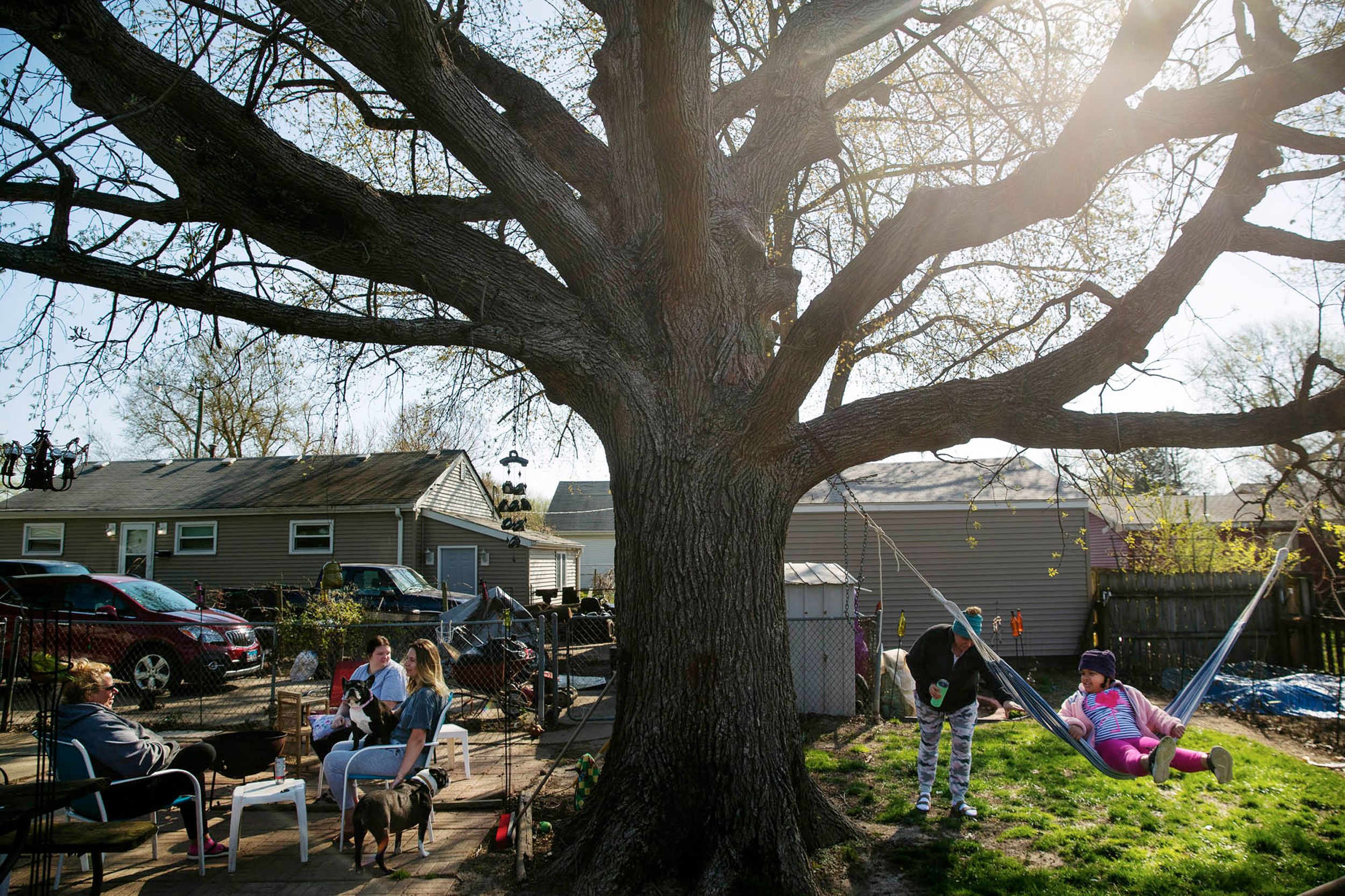 Family and friends gather in backyard during COVID-19 lockdown, April 2020, sharing time together while sheltering in place.