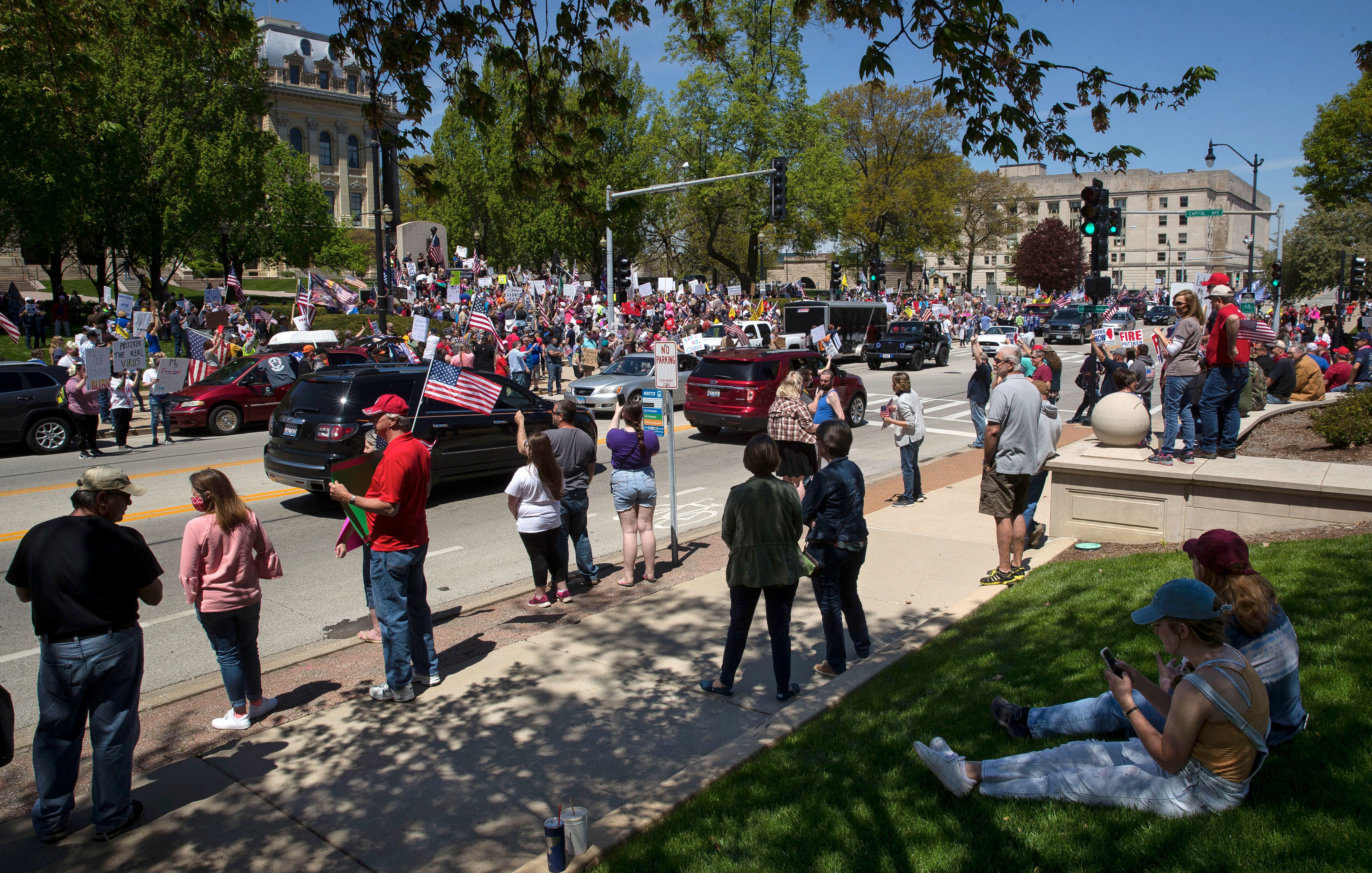 A crowd of protesters opposing the stay-at-home order gather outside the Illinois Capitol, May 2020.